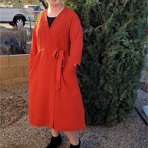 Torrid orange dress with side tie & pockets size 2